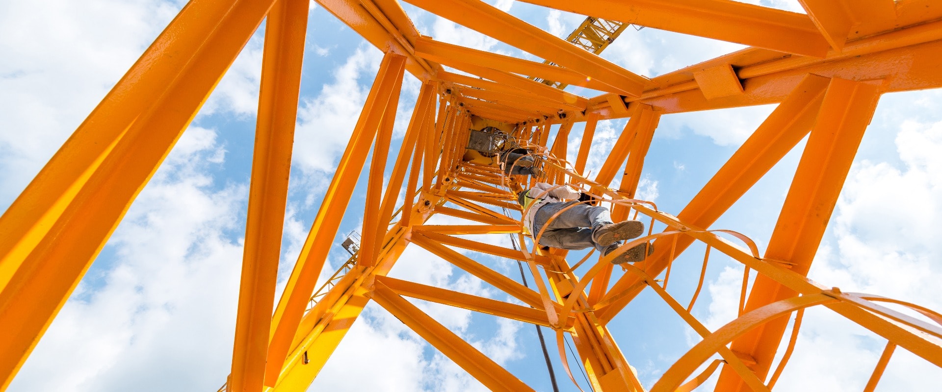 worker working on the construction crane